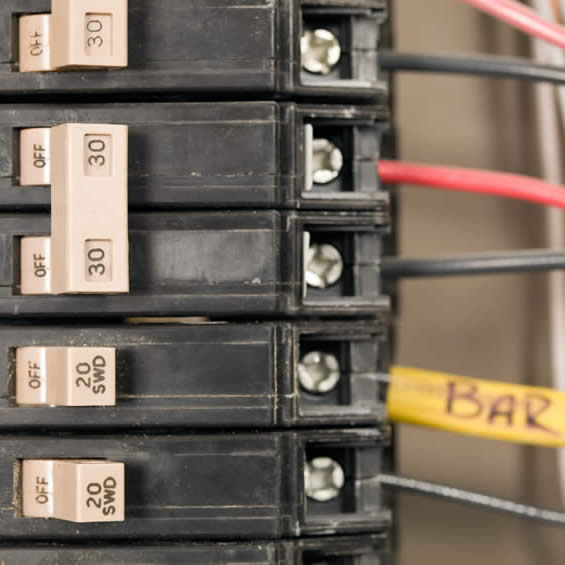 Electrical board with switches being inspected inside a home in Florida, USA