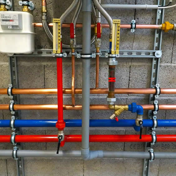 Plumbing system with pipes being inspected outside a home in Florida, USA