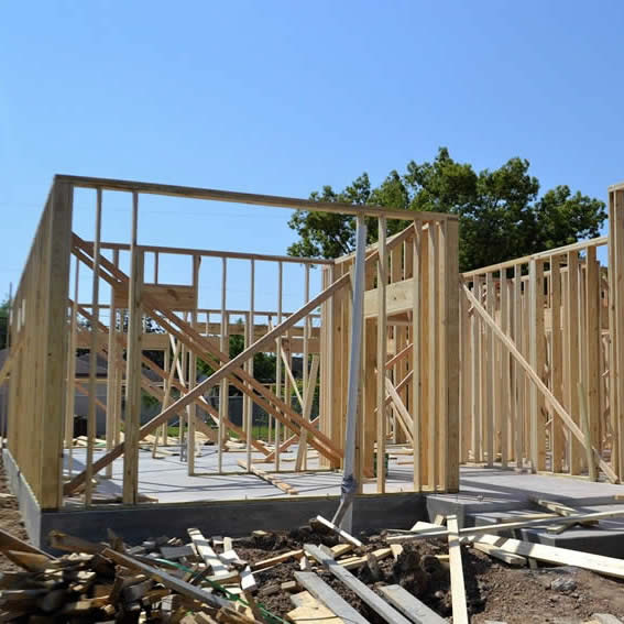 New home wooden beams being installed and inspected to construct a new home in Florida, USA